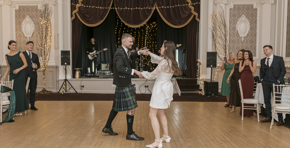 A bride and groom on the dancefloor in the Ballroom at Peebles Hydro